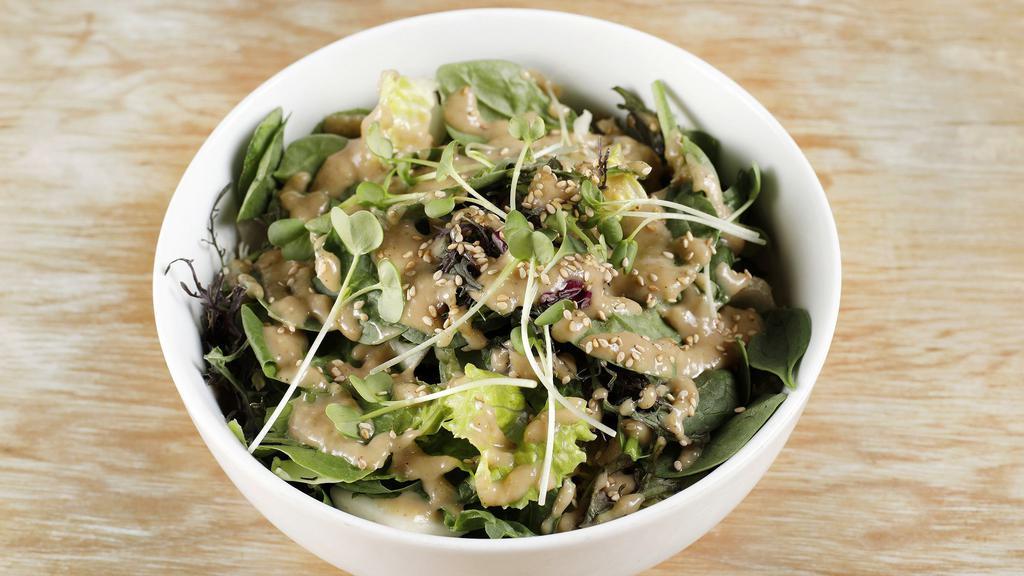 Spinach Salad · Spinach and cabbage with sesame miso dressing.