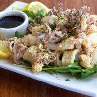 Frittura Di Calamari · Fresh fried squid served with chef’s signature dip sauce “balsamic reduction”.