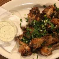 Petaluma Chicken Wings · Marinated in garlic and soy sauce, baked in our brick oven. With house-made ranch dressing w...