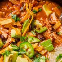 Chicken Tortilla Soup · Hot and hearty chunks of tender chicken breast and fresh avocados are steamed up with tortil...