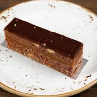 Valrhona Chocolate Brownie · Marcona almonds and salted caramel.