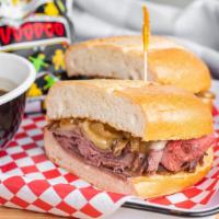 French Dip Sandwich · Roast beef, grilled onions, swiss cheese, horseradish on toasted French roll. Served with Au...