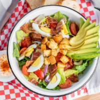 The Wedgie Salad · Romaine, hard boiled eggs, bacon, avocado, cherry tomatoes, red onions, sunflower seeds, gar...