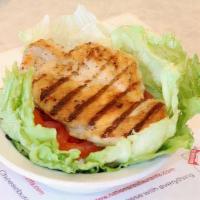 Lettuce Chicken Wrap · No bun. Grilled Chicken with tomatoes, onions and dressing. Served wrapped in lettuce.