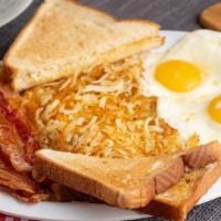 Giant Two-Egger · 2 extra large AA grade eggs. Your choice of meat served with double portion of hash browns a...