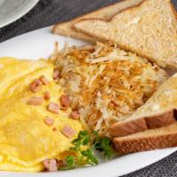Meat Omelet · 3 extra large AA grade egg omelet with choice of meat served with hash browns and choice of ...