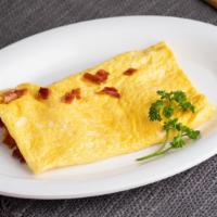 Meat Omelet (A La Carte) · 3 extra large AA grade eggs served with choice of meat.