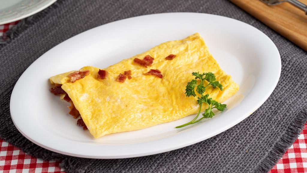 Meat Omelet (A La Carte) · 3 extra large AA grade eggs served with choice of meat.