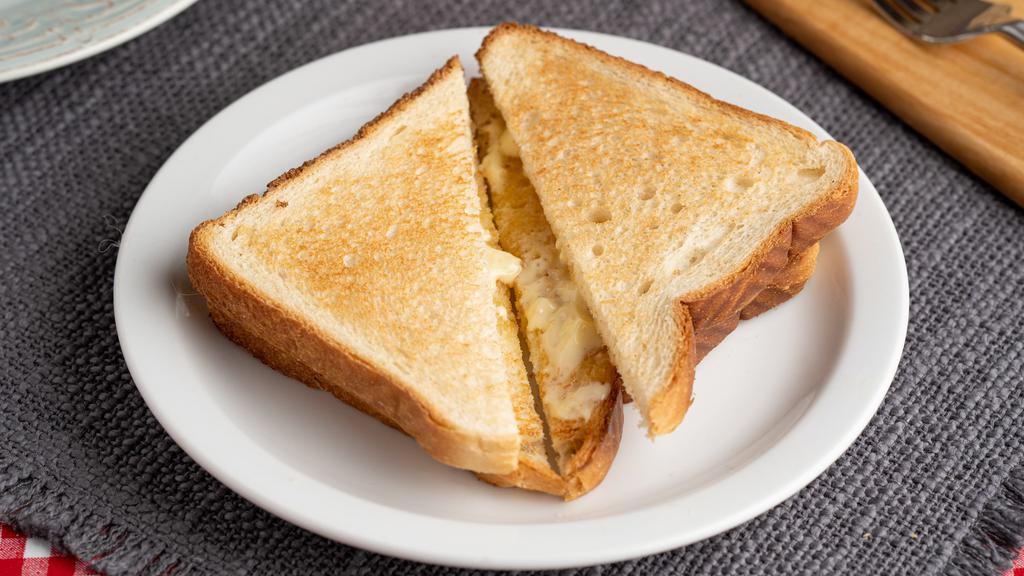 Toast · 2 Slices of your choice (White/Wheat/SourDough).