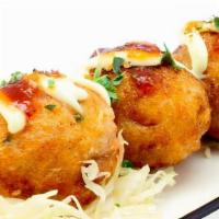 Takoyaki (6pc) · Traditionally considered Japanese street food. Little leg of octopus, battered and fried int...