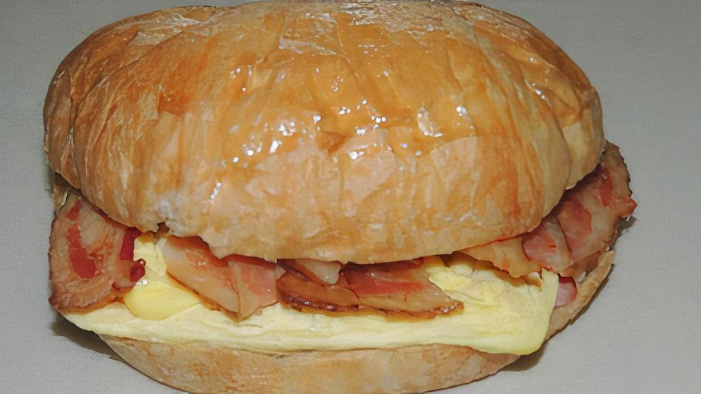 6. Bacon, Egg and Cheese Croissant · A butter croissant with bacon, egg and American cheese.