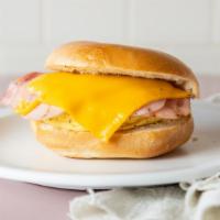 1. Ham, Egg and Cheese Bagel · Toasted, buttered plain bagel with ham, egg and american cheese.