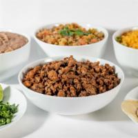 Taquiza Familiar / Family Platter · A family platter with meat of your choice served with a side of rice, beans, salsa, and tort...