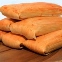 Tamales (ea) · Cooked in corn husks, prepared with corn meal dough filled with a savory filling of your cho...