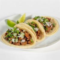 Taco (Ea) · Taco served on 2x corn tortillas with choice of meat and topped with fresh chopped cilantro ...