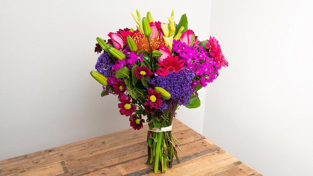 Vibrant Primary Colors Wrapped Bouquet · The colors of the rainbow in all of their showiest tones.

Seasonal options may vary throughout the year and depending on location. Our florist will provide the best available flowers for your order!