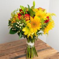 Yellow, Orange, Red Wrapped Bouquet · Seasonal options may vary throughout the year and depending on location. Our florist will pr...
