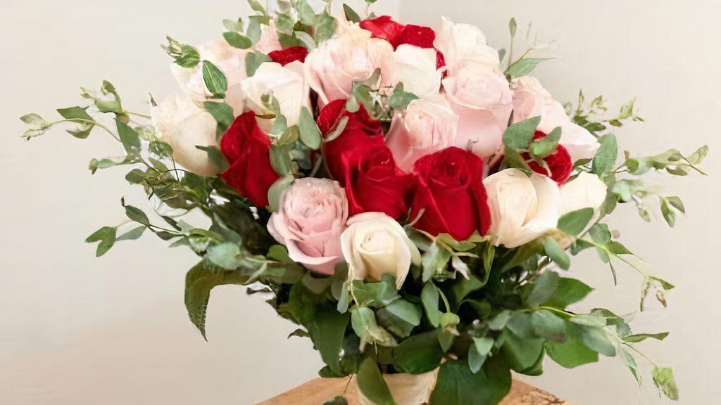 Array Of Roses Wrapped Bouquet · Whether just for you or the love of your life, the Array of Roses bouquet brings love, joy, and beauty to any situation.
