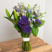 White, Blue, Purple Wrapped Bouquet · Seasonal options may vary throughout the year and depending on location. Our florist will pr...