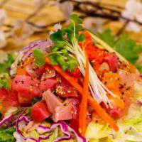 Chef Sashimi Salad · assorted fish tossed with mustard and soy dressing on mixed greens and seaweed salad