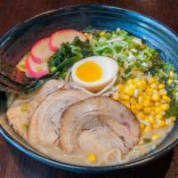 Garlic Tonkatsu Ramen · It contains pork and are served with corn, bean sprouts, fish cake, green onion, seaweed, so...