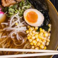 Shoyu Ramen · It contains pork and are served with corn, bean sprouts, fish cake, green onion, seaweed, so...