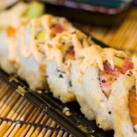 Crunch Roll · Crab, tuna, salmon, ebi, avocado, tempura flakes.