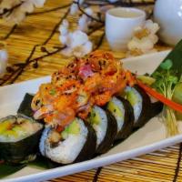 Umami Roll · Inside: crab, unagi, avocado, cucumber, oshinko and yamagobo. Top: mixed fish poke, tobiko a...
