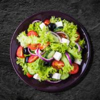 Greek Veggie Salad  · Prepared with fresh Lettuce, cucumber, tomatoes, onions, olives, and feta cheese tossed with...