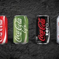 Canned Soda · Carbonated soda which quenches your thirst.