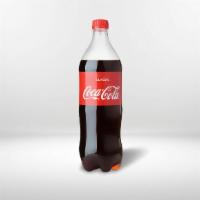 Soda Bottle (2 ltrs) · Carbonated soda which quenches your thirst.