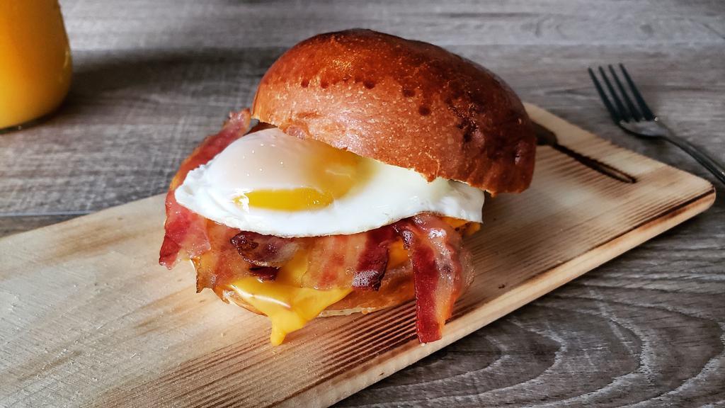 Wake Up · Bacon. Cheese. Egg. Brioche Bun, English Muffin or Bagel.