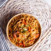 Seafood Kimchi Chow Mein · Delicious and spicy noodles, served with fresh seafood and kimchi.