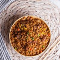 Beef Kimchi Fried Rice · Delicious and spicy rice with juicy beef and kimchi.