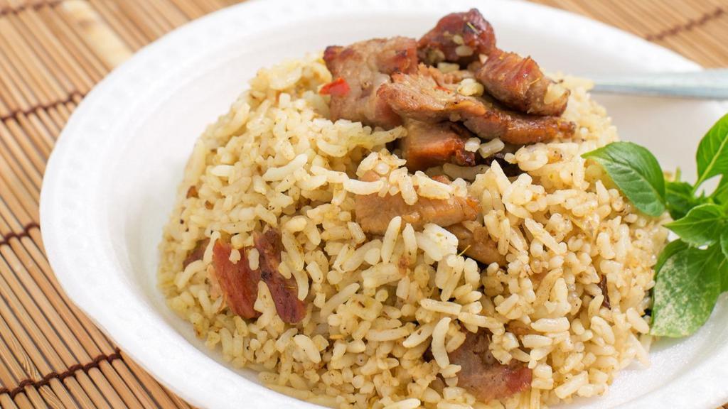 BBQ Pork Fried Rice · Delicious and authentic rice topped with delicious marinated BBQ pork.