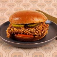 Fried Chicken Sandwich · Crispy fried chicken breast with pickles and mayo on a buttery brioche bun.