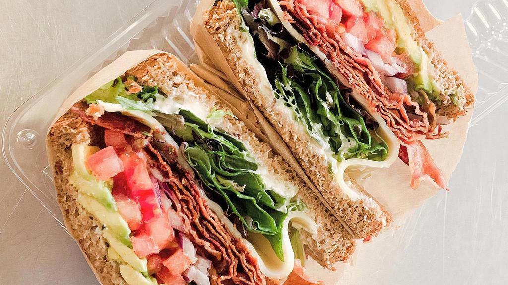 The Ultimate B.L.T. · Smoked bacon, greens, tomato, red onion, swiss cheese, avocado, mayo