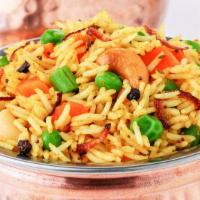 Vegetarian Biryani · Fresh basmati rice loaded with traditional spices and veggies with a side of raita yogurt di...