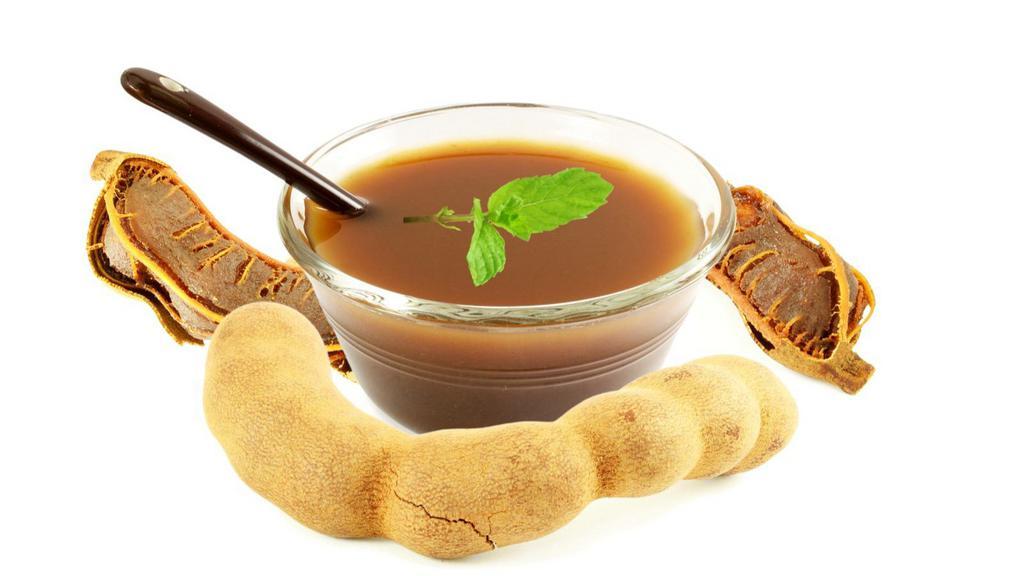 Tamarind Chutney  · Traditional sweet and tangy dipping sauce.