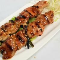 Yaki-Tori · Skewered chicken and green onion with teriyaki sauce.