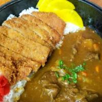 Beef Curry · Homemade curry with beef. Comes with salad and rice.