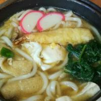 Nabeyaki Udon · Noodle in fish broth with veggie, chicken, fish cake, and shrimp tempura.
