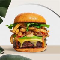 Freedom Fries Burger (Vegan) · Seasoned vegan burger patty topped with fries, avocado, melted vegan cheese, caramelized oni...