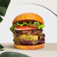 Fondue of You Burger (Vegan) · Seasoned vegan burger patty topped with mushrooms, melted vegan cheese, lettuce, tomato, oni...