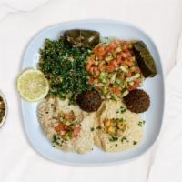 The House Veggie Combo Bowl · Hummus, baba ghanoush, med and tabbouleh salad, falafel and dolma.