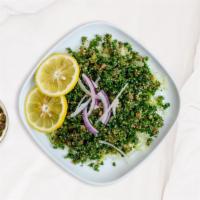 Tabouleh Out To Play Salad · Vegetarian salad made out of parsley, tomatoes, mint, onions, and olive oil, and lemon juice.