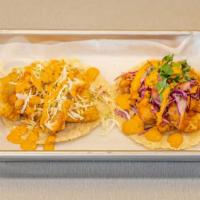 Fish or Shrimp Tacos · Beer-battered fish filet or shrimp with shredded cabbage & chipotle sauce.
Or grill only
