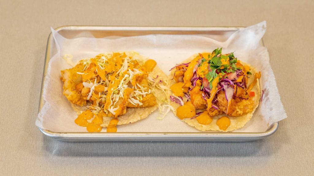 Fish or Shrimp Tacos · Beer-battered fish filet or shrimp with shredded cabbage & chipotle sauce.
Or grill only
