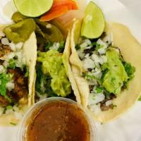 Tacos  · Al pastor  / azada / chicken / carnitas / birria