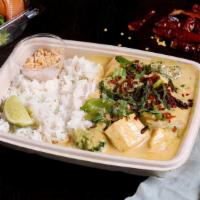 Tofu Yellow Curry · Tofu & vegetables, fresh herbs, lime & fried shallots.